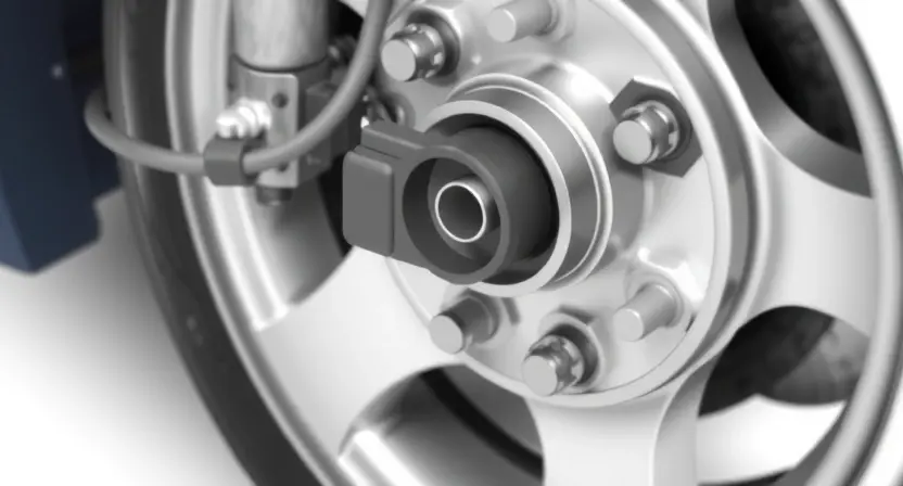 A close-up, detailed illustration of a car's front left wheel hub assembly. The focus should be on the wheel speed sensor and its connection points. Show the sensor clearly, highlighting its physical form and how it integrates with the wheel hub. The background should be blurred, suggesting the rest of the car is out of focus. The image should convey a sense of technical precision and diagnostic inspection.
